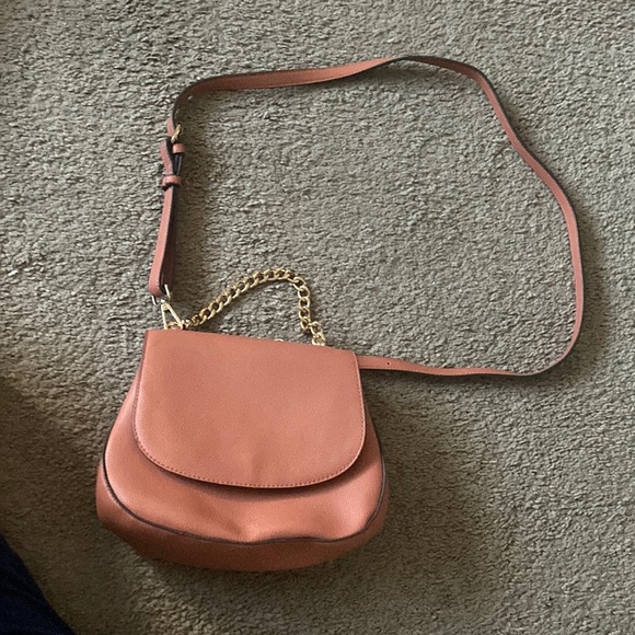 a new day Handbags - This is a peach color, a crossbody bag from target.